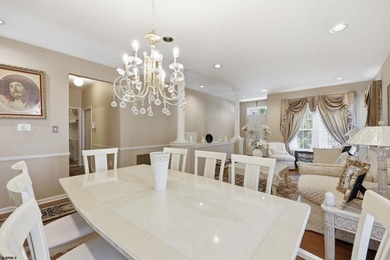 This stunning two-story single-family home is nestled in the - photo 8