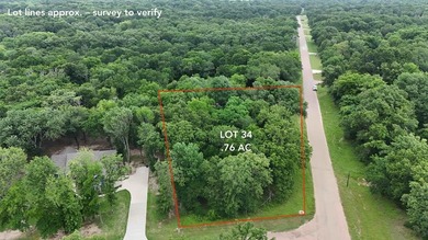 Charming 0.76-acre lot in an established section of Oakmont with - Lake Lot For Sale in Mabank, Texas