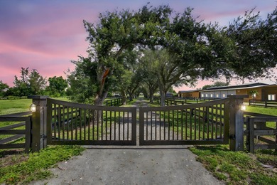 EXCEPTIONAL TURNKEY EQUESTRIAN FACILITY ON 6 ACRES IN RUSTIC - photo 2