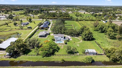 EXCEPTIONAL TURNKEY EQUESTRIAN FACILITY ON 6 ACRES IN RUSTIC - photo 4