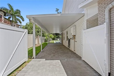 Tucked away on a quiet dead end street and backing up to the - photo 4