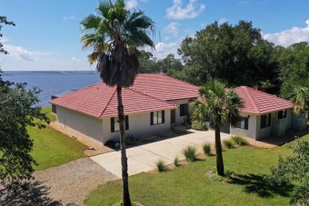 Lake Home Off Market in Eastpoint, Florida