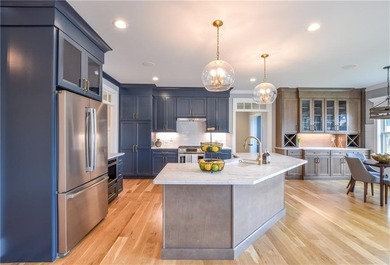 The Wickford III is a 3,128 sq. ft. custom 2-story home by - photo 6