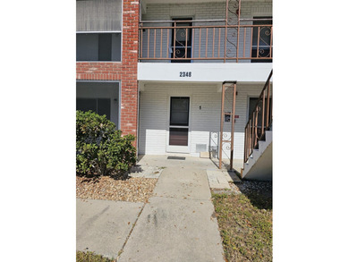 FIRST FLOOR! CORNER UNIT! NEW ROOF! Make this 2 bedroom, 1 bath - photo 1