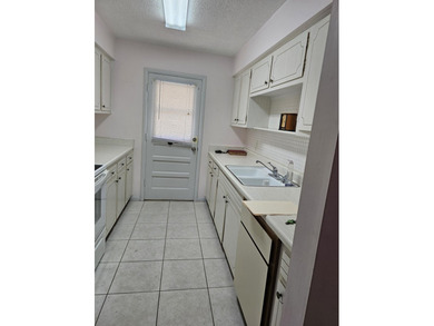 FIRST FLOOR! CORNER UNIT! NEW ROOF! Make this 2 bedroom, 1 bath - photo 7