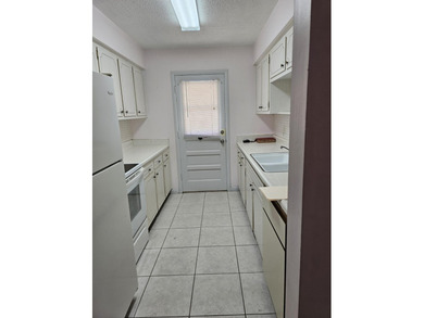 FIRST FLOOR! CORNER UNIT! NEW ROOF! Make this 2 bedroom, 1 bath - photo 8