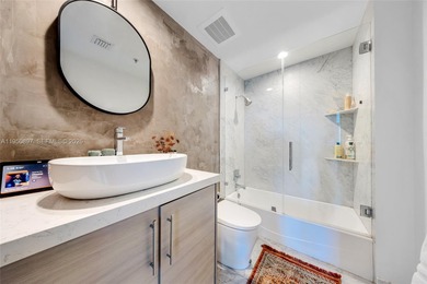 Indulge in breathtaking views from every room in this modern 2