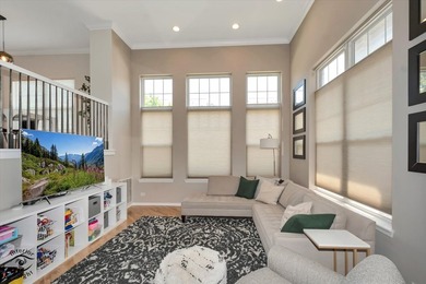 Step into three levels of light-filled living in this - photo 6