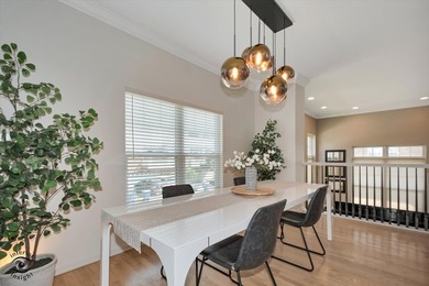 Step into three levels of light-filled living in this - photo 9