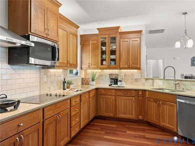 Custom-built and situated on 3.42 private wooded acres, this - photo 5