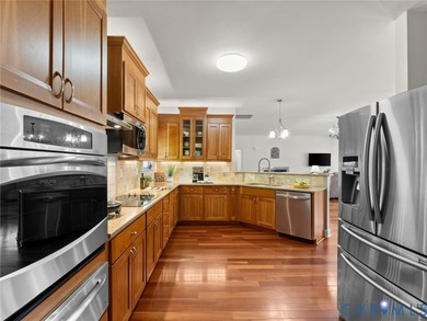 Custom-built and situated on 3.42 private wooded acres, this - photo 7