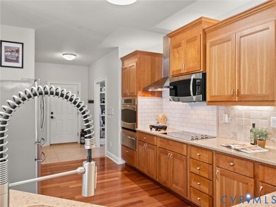 Custom-built and situated on 3.42 private wooded acres, this - photo 8