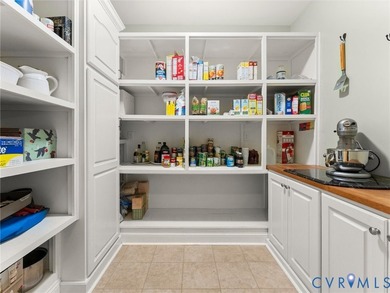 Custom-built and situated on 3.42 private wooded acres, this - photo 10