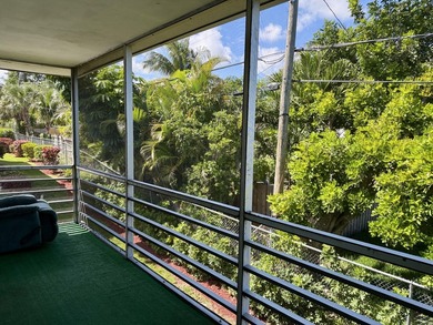 Welcome to this spacious 2 bedroom, 1-bath condo located on the - photo 2
