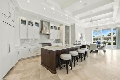 This coastal-inspired estate, built by Braun Builders, offers 5