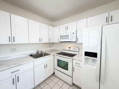 Welcome to this spacious 2 bedroom, 1-bath condo located on the - photo 4