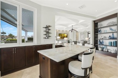 This coastal-inspired estate, built by Braun Builders, offers 5