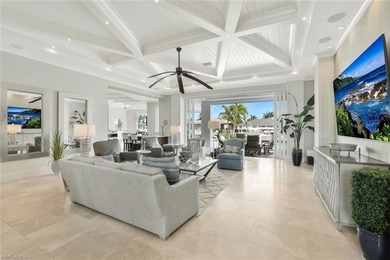 This coastal-inspired estate, built by Braun Builders, offers 5