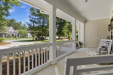 Hampton Lake is a gated community in Bluffton, centered around a - photo 2