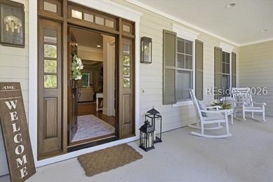Hampton Lake is a gated community in Bluffton, centered around a - photo 9