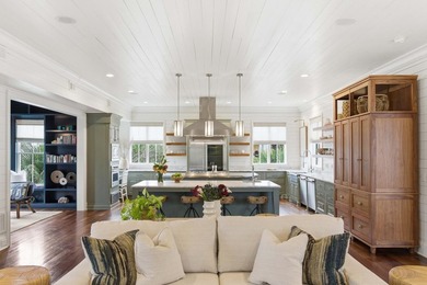 Set on an elevated corner lot along one of Sullivan's Island's - photo 9