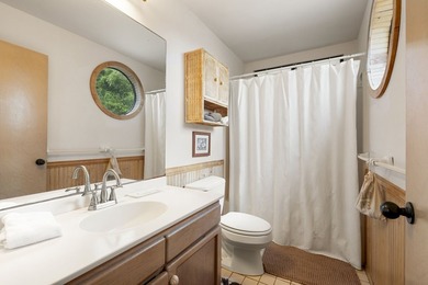 Located in the *Queen's Bath* neighborhood and nestled at the - photo 17