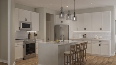 The Addison plan is an interior two-story townhome with the - photo 4