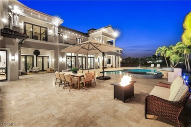 Unobstructed tropical waterfront views define this fully - photo 3