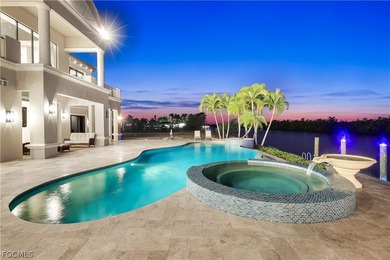 Unobstructed tropical waterfront views define this fully - photo 4