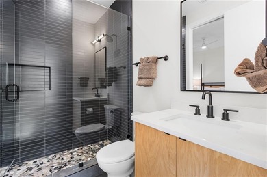 This Modern Beauty is just steps from the beach, located on the - photo 21