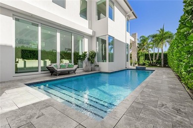 This Modern Beauty is just steps from the beach, located on the - photo 29