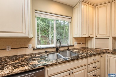 This beautifully appointed home offers water views, thoughtful - photo 21