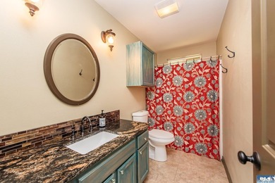 This beautifully appointed home offers water views, thoughtful - photo 22