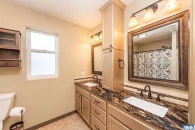 This beautifully appointed home offers water views, thoughtful - photo 28