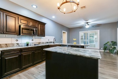 $40,000 PRICE IMPROVEMENT!! Experience elegant living in this - photo 31