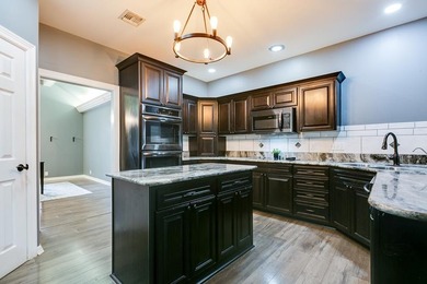 $40,000 PRICE IMPROVEMENT!! Experience elegant living in this - photo 32