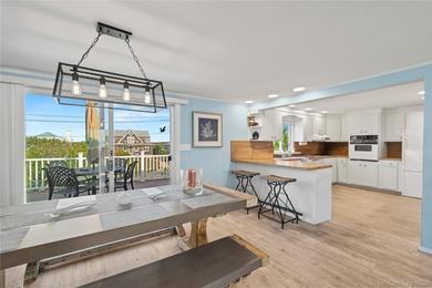 Experience the essence of Hamptons Oceanfront living in this - photo 12