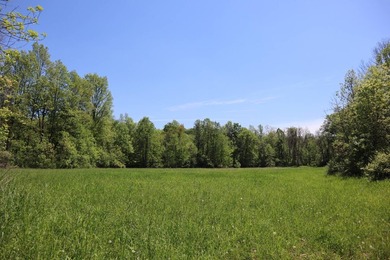 Sitting on a peaceful country road is this beautiful farming and - photo 16