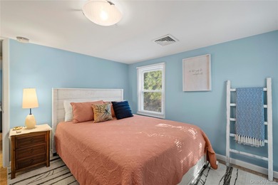 Experience the essence of Hamptons Oceanfront living in this - photo 19