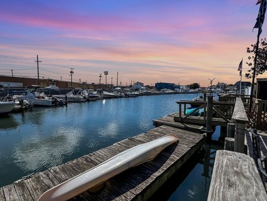 Discover a charming waterfront retreat in Oceanside, NY. This - photo 1