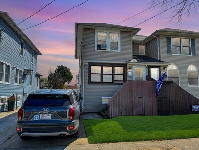 Discover a charming waterfront retreat in Oceanside, NY. This - photo 2