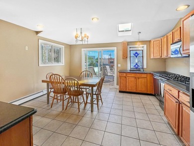 Discover a charming waterfront retreat in Oceanside, NY. This - photo 4