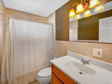 Discover a charming waterfront retreat in Oceanside, NY. This - photo 6