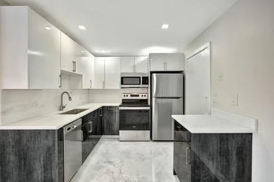 PRICE REDUCTION , STEPS FROM THE BEACH !! AVAILABLE NOW AND EASY - photo 6