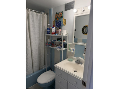 Repriced! Wake up to breathtaking beach views in this - photo 9