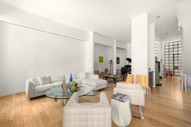 327 East 18th Street is a 20-foot-wide townhouse on one of - photo 2
