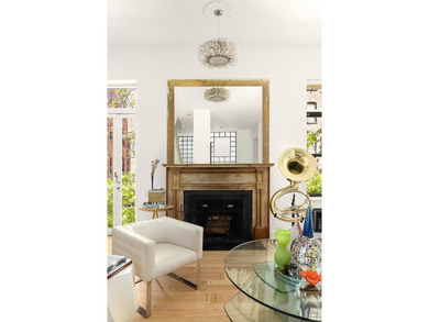 327 East 18th Street is a 20-foot-wide townhouse on one of - photo 3