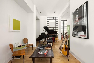 327 East 18th Street is a 20-foot-wide townhouse on one of - photo 4