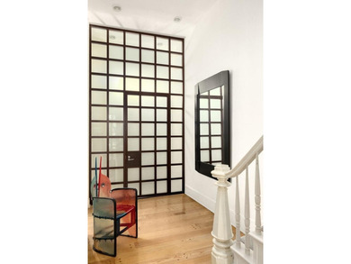 327 East 18th Street is a 20-foot-wide townhouse on one of - photo 5
