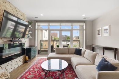 This 3-bedroom, 2-bath newer construction condo in a boutique - photo 3